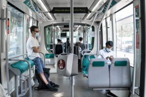 Passengers wearing face masks on a tram in Barcelona