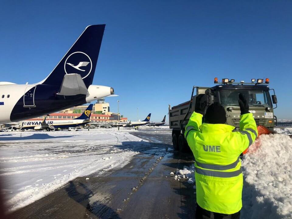 Personnel from Spain's Unidad Militar de Emergencias (UME) helping to clear the snow from Madrid Airport on 11 January 2020.