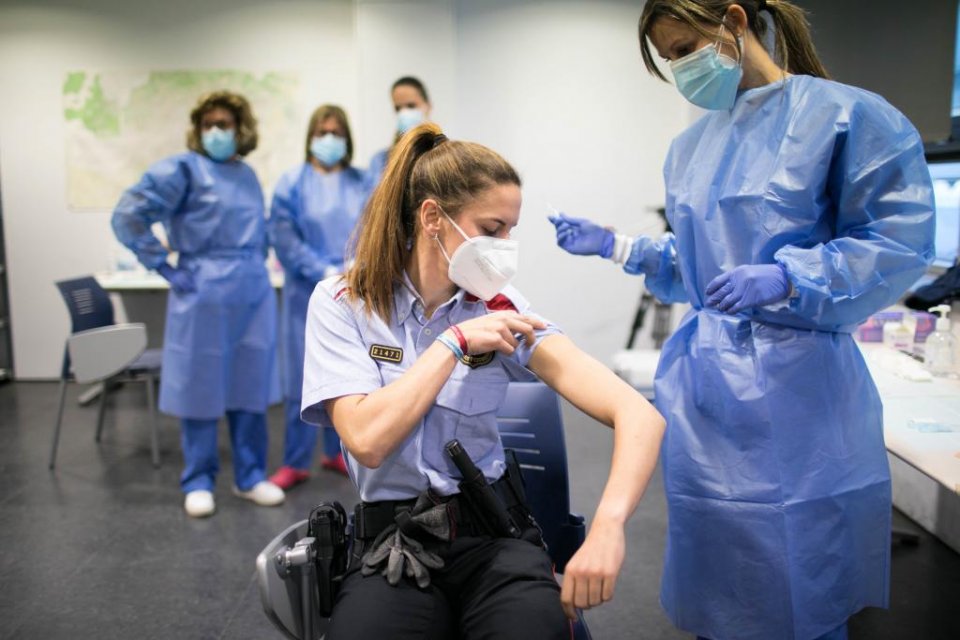 A jab of the Covid-19 vaccine being administered to an agent of the Catalan police