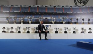 Sergio Ramos with Real Madrid's trophies.