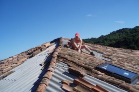 Tiling the roof. (Lisa Rose Wright)