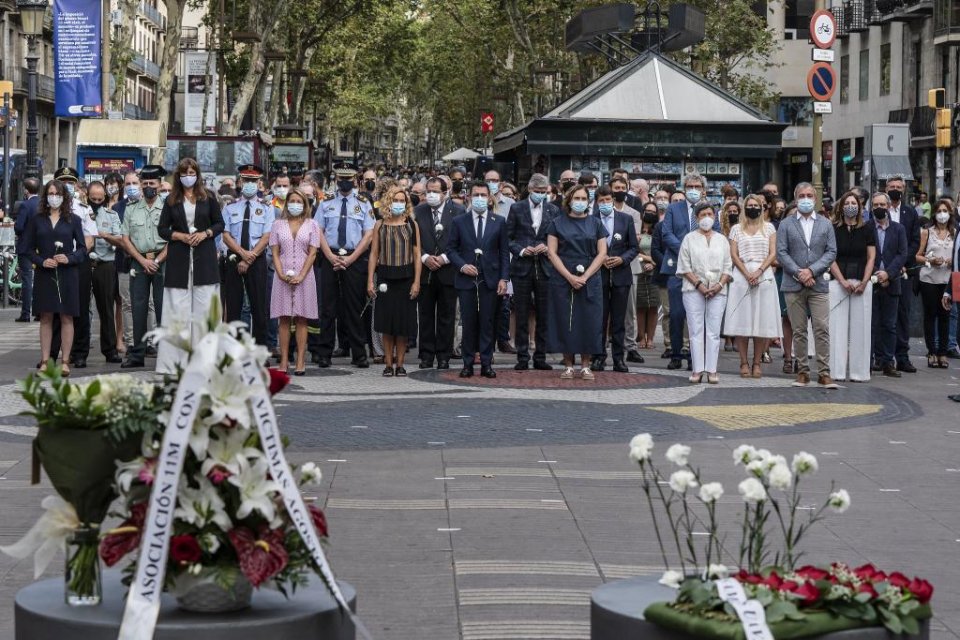Catalan president Pere Aragonès and the mayor of Barcelona, Ada Colau, together with other politicians and dignitaries, paying tribute to victims on the fourth anniversary of the Barcelona terror attack in La Rambla on 17 August 2021.