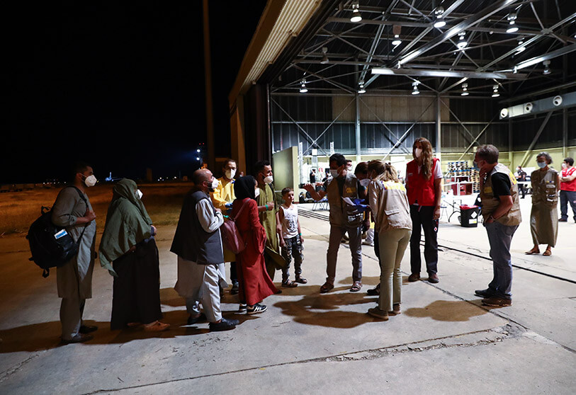 Afghan evacuees being received at the Torrejón de Ardoz air base in Madrid