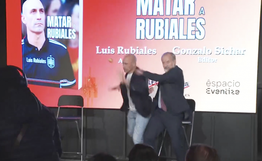 Convicted former Spanish football chief pelted with eggs at book...