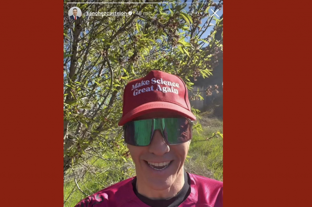 Spain’s Sánchez wears ‘Make Science Great Again’ cap in apparent swipe at Trump